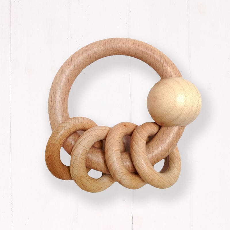 These stimulating wooden rattles have loose wooden rings around the outside, so are great for capturing baby's attention.  Chunky wooden design and suitable for newborn to 12 months old. A great little item to keep in your changing bag and keep baby occupied whilst out and about.  Perfect small size to fit in little hands, and a great game for mummies and babies to enjoy.