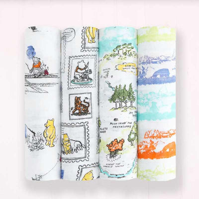aden + anais Disney™ Winnie The Pooh Swaddle Blanket - Single. This aden + anais  single muslin blanket is traditionally used for swaddling babies, these wraps can also be used for nursing, changing table covers, burping cloths, tummy time blankets and more. Never be ashamed to take your muslin out of your changing bag again, which this designer print version - you'll always be keeping it for 'best'!