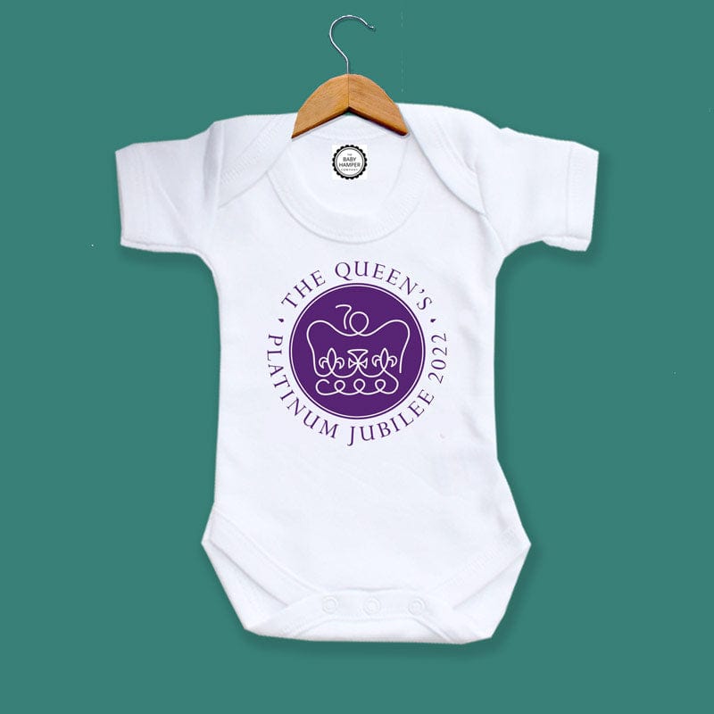 Introducing our Queen's Platinum Jubilee 2022 Baby Bodysuit! This stylish and comfortable baby outfit is perfect for your little one to celebrate the special occasion in style. The beautiful purple Jubilee emblem is sure to make your baby stand out from the crowd, and the envelope neckline and popper fastening make it easy to get on and off. Made from 100% cotton, this bodysuit is soft, durable and gentle on your baby's skin.