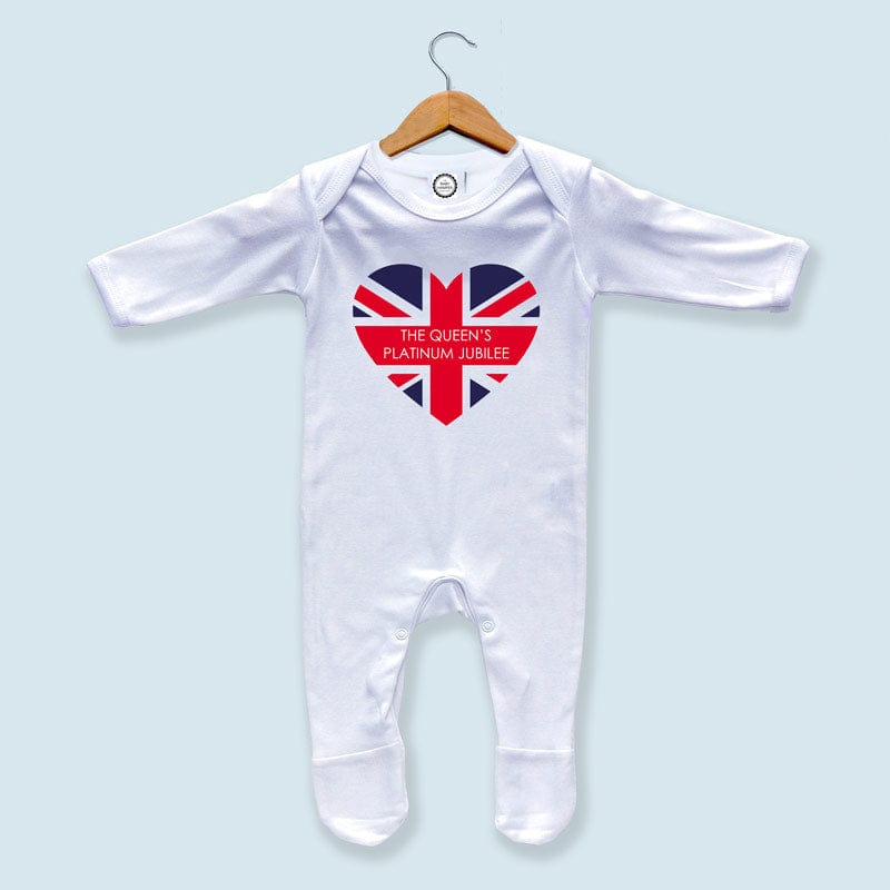 Give your newborn a piece of royal history with this Queen's Jubilee 2022 Baby Sleepsuit. Made from 100% cotton, this soft and comfortable sleepsuit is perfect for little ones to wear during nap time or bedtime. The envelope neckline and popper fastening make it easy to put on and take off, while the Union Jack design pays tribute to the Platinum jubilee in 2022.