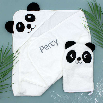 Your little one will enjoy bath time with this Panda towel and wash mitt set! Beautifully embroidered with your choice of name, this hooded white towel makes a beautiful baby shower gift as well. This cute set is made from deliciously soft 100% cotton terry cloth that's perfect for snuggling into after a nice warm bath. The wash mitt has a slot at the bottom to fit over your hand so it's easy to scrub those tiny digits clean.