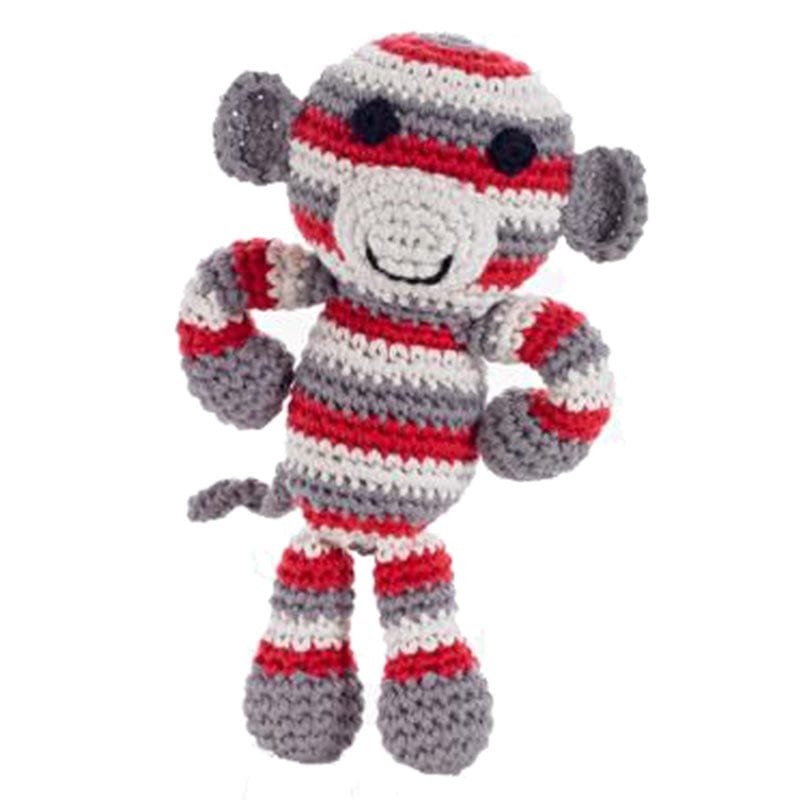 A striped red knitted monkey, with a very cheeky little face! Suitable from birth, babies will love his tactile knitted texture and stripe print. A toy to last for many years to come.  Hand knitted using organic cottons in a fair trade environment.  Size approx - 20cm  100% cotton  