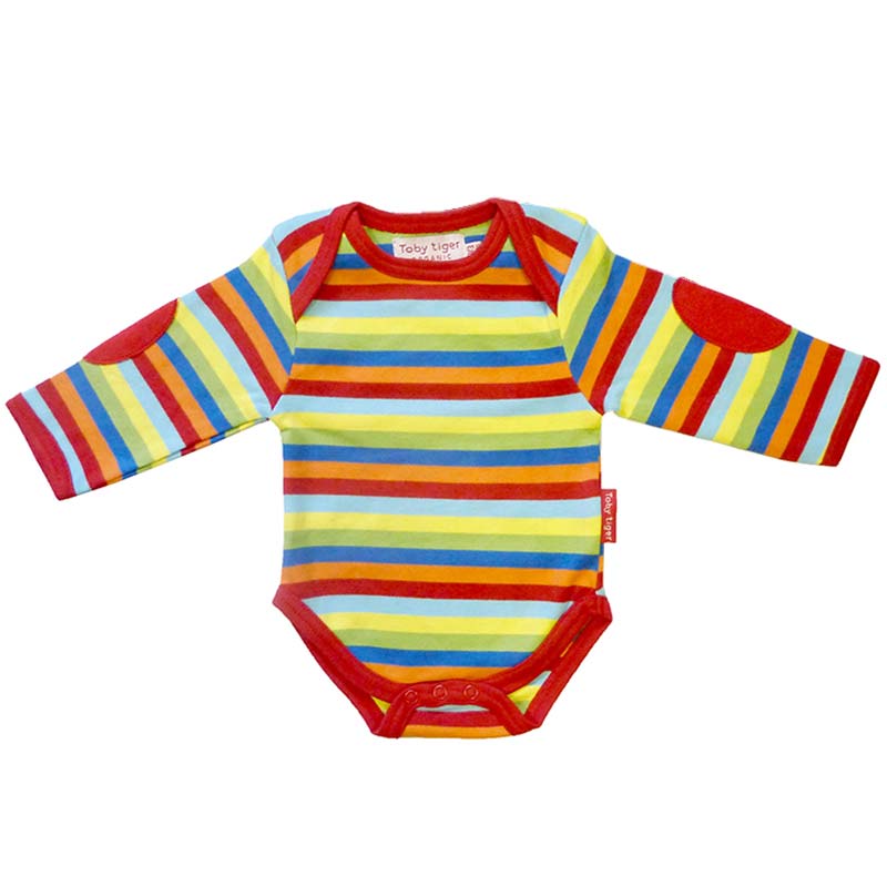 A bright stripe t shirt from British designer baby clothing brand Toby Tiger. This super soft organic cotton t shirt is great as a baby base layer or paired with trousers for boys or little leggings for girls. Patch detail to arms.  Ideal for adding to a baby box for a baby shower as unisex design.  Features popper bottom.   Age 0-3 month
