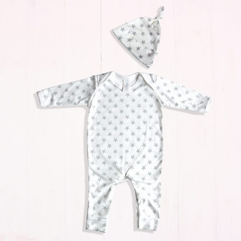 Gorgeous grey and white star print unisex matching baby clothes outfit set by The Baby Hamper Company. Comprising a 100% cotton sleep suit (0-3 months) and 100% cotton hat (age 0-6 months).  Exclusively designed and manufactured in the UK for The Baby Hamper Company. Add one to one of our baby hampers today and you won't be disappoint