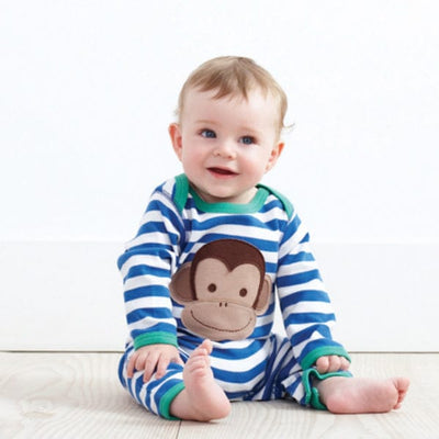 A gorgeous bright baby sleep suit by British designer baby clothing brand Toby Tiger.  Designed especially with little boys in mind.  Royal blue and white stripes, with green edging detail and a cheeky monkey face applique to the front.  Age 0-3 months, or 56cm lengt